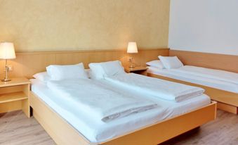 Hotel Brenner Dreibettzimmer